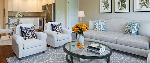 Living room and kitchen of an independent living apartment at Springhouse