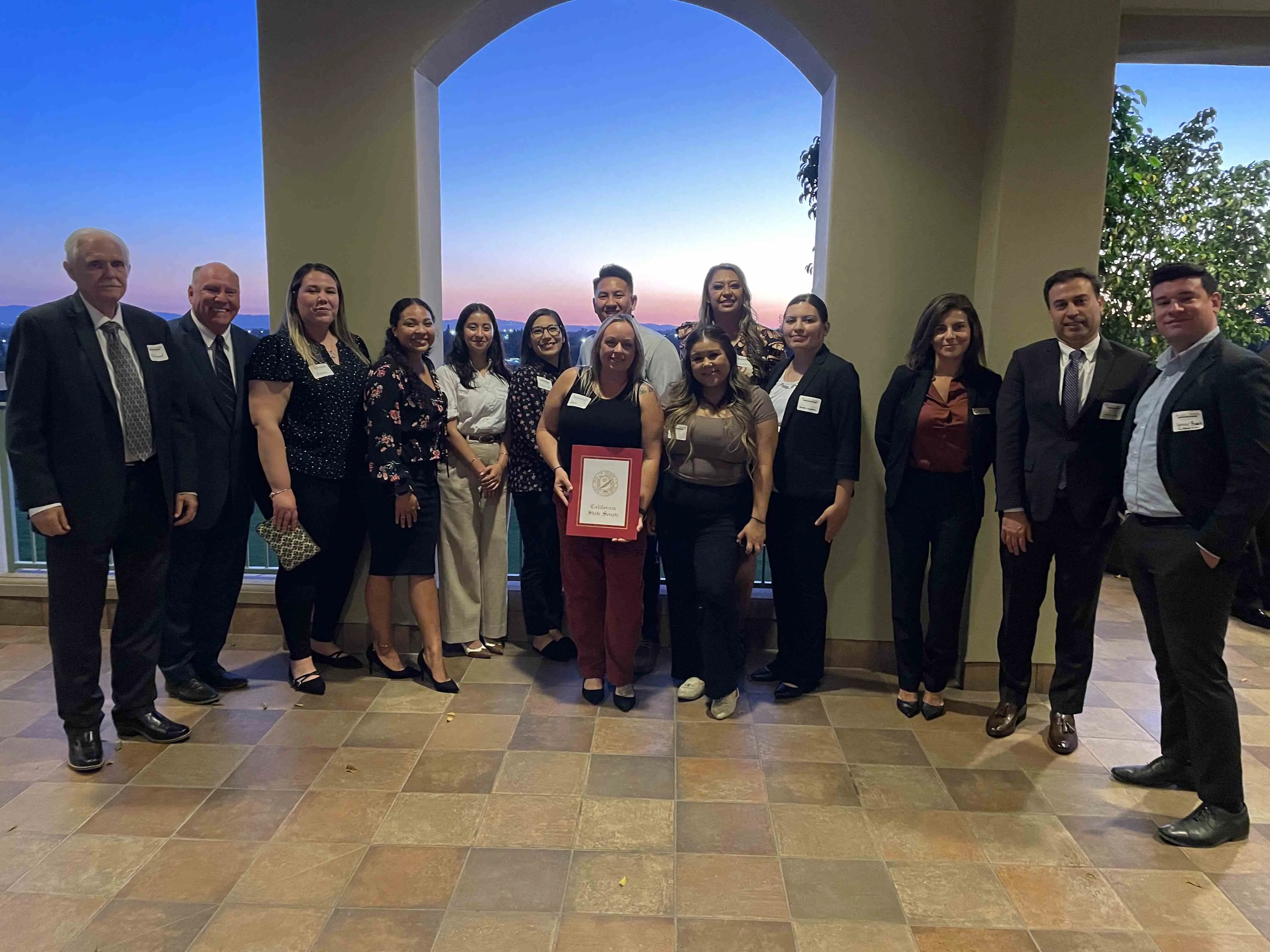 group photo of all honorees with Ronald Roland