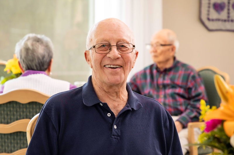 A smiling resident at Westminster Gardens.