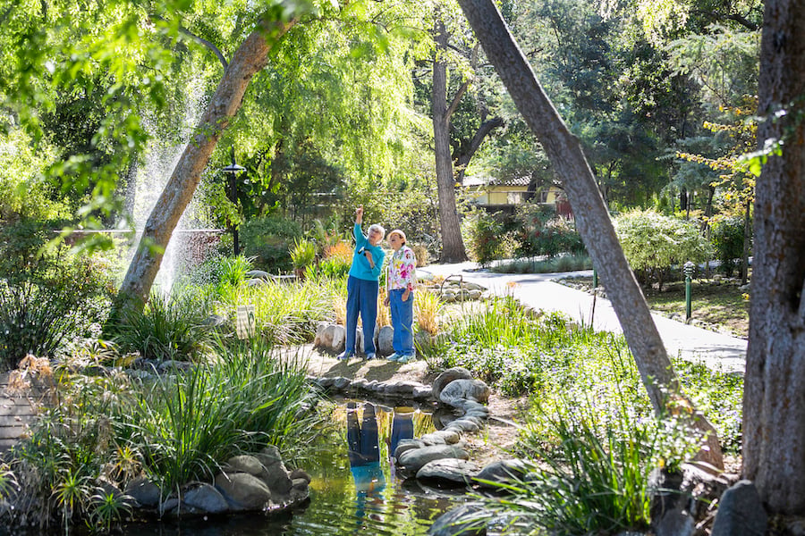 2 women by pond