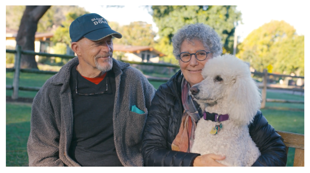 couple with dog